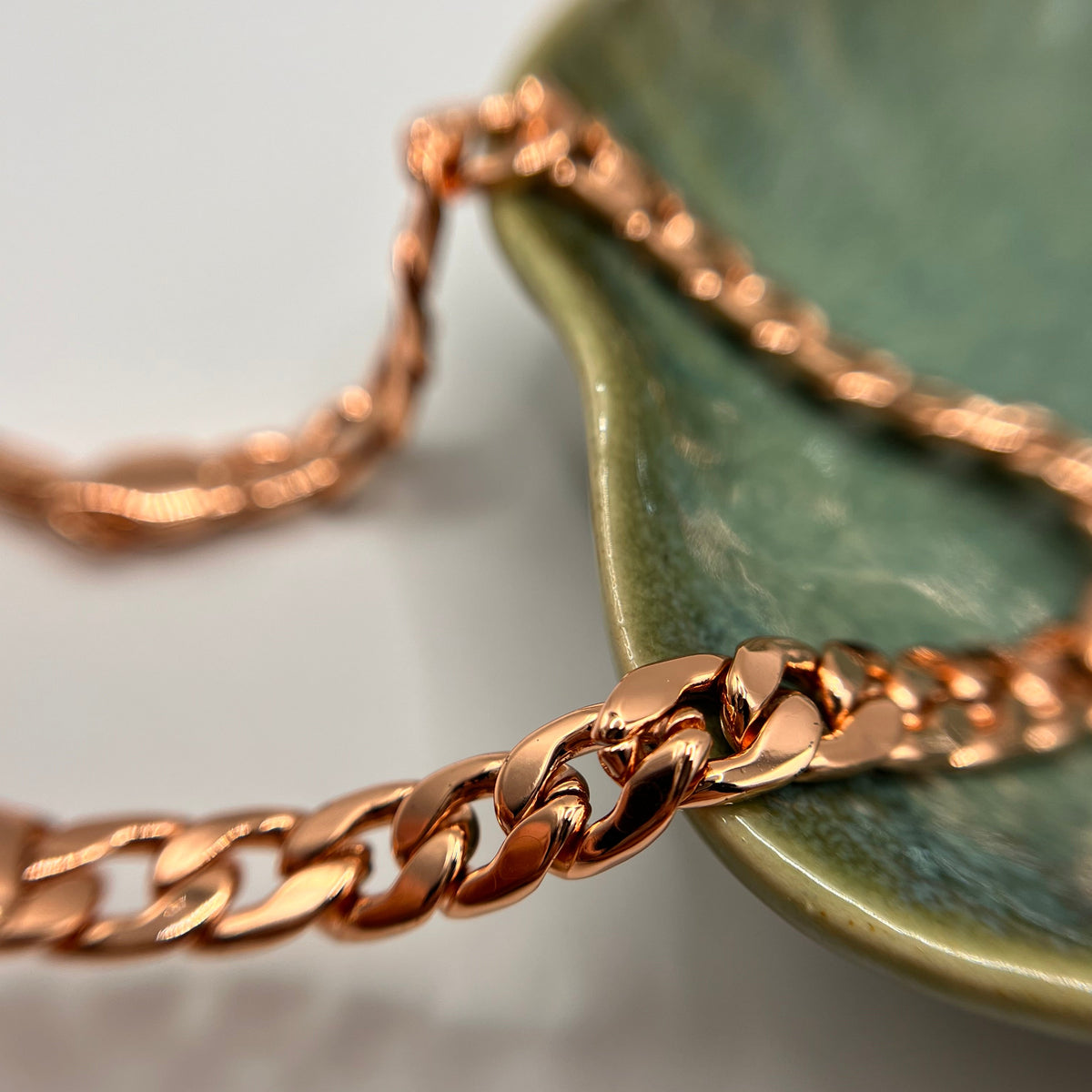 Rose gold Miami curb anklet links up close