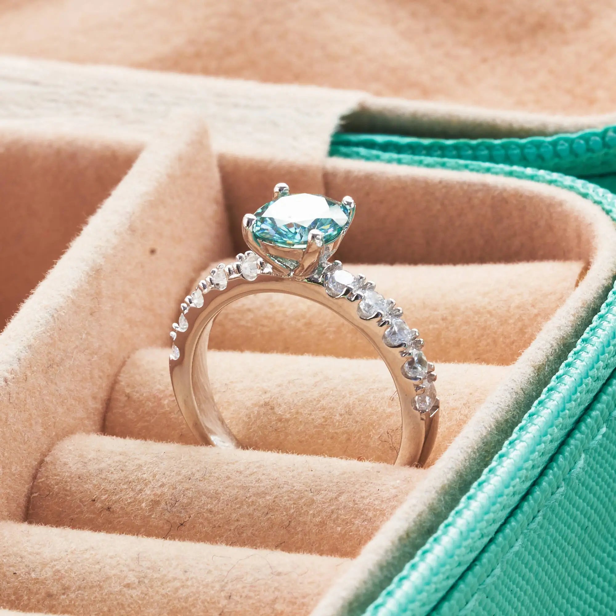 Pavé moissanite solitaire ring in a jewellery box