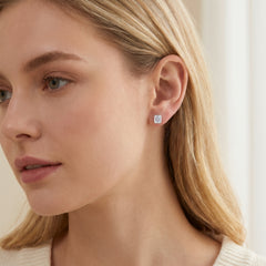 Emerald Cut Moissanite Stud Earrings worn on the ear