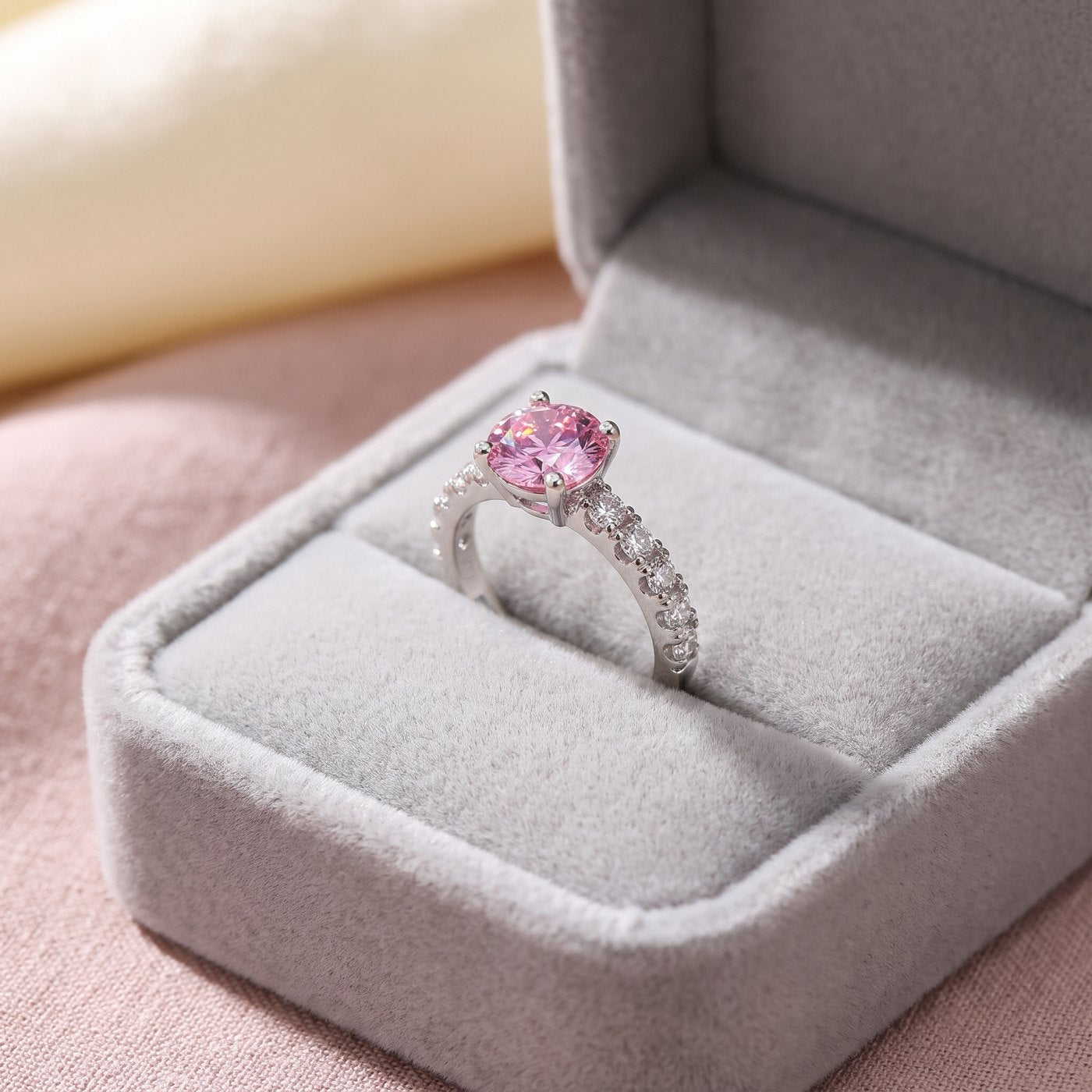 Pink pavé moissanite solitaire ring in a velvet gift box